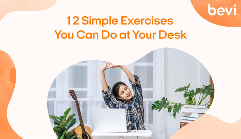 Image shows a girl stretching her arms at a white desk with the words "12 simple exercises you can do at your desk"