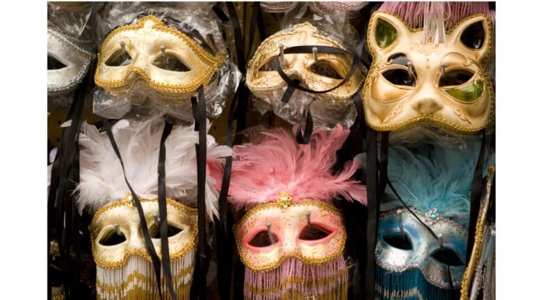 Two rows of fancy costume ball masks