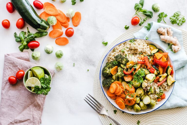 Bowl of fresh salad and vegetables with a fork