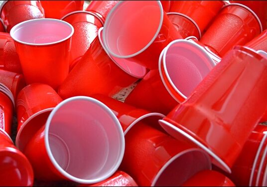 A pile of red solo drink cups